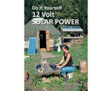 Book cover of 'Do It Yourself 12 Volt Solar Power' with a person using a laptop outdoors.