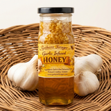 Jar of Garlic Infused Honey with garlic bulbs on a woven basket